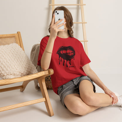 Black graphic T-shirt by Printify featuring dripping lips with "hmm..." bite design on the front.