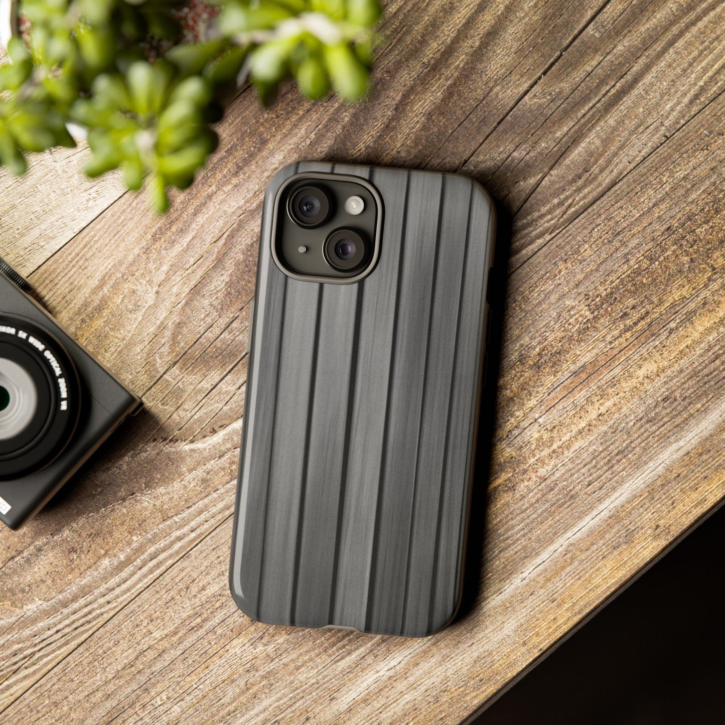 Ribbed metal texture phone case for iPhone with tough protective design, printed by Printify, showing a sleek, durable phone cover.