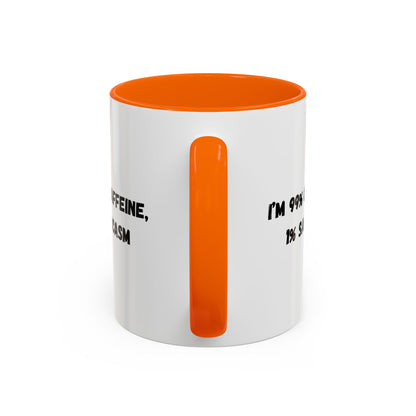 Ceramic coffee mug with "I'm 99% Caffeine, 1% Sarcasm" print, featuring a white background and black text design.