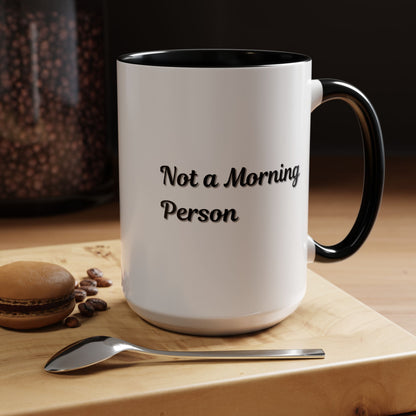 Ceramic accent coffee mug with "Not a Morning Person" print, 11oz or 15oz size, by Printify, featuring bold text design.