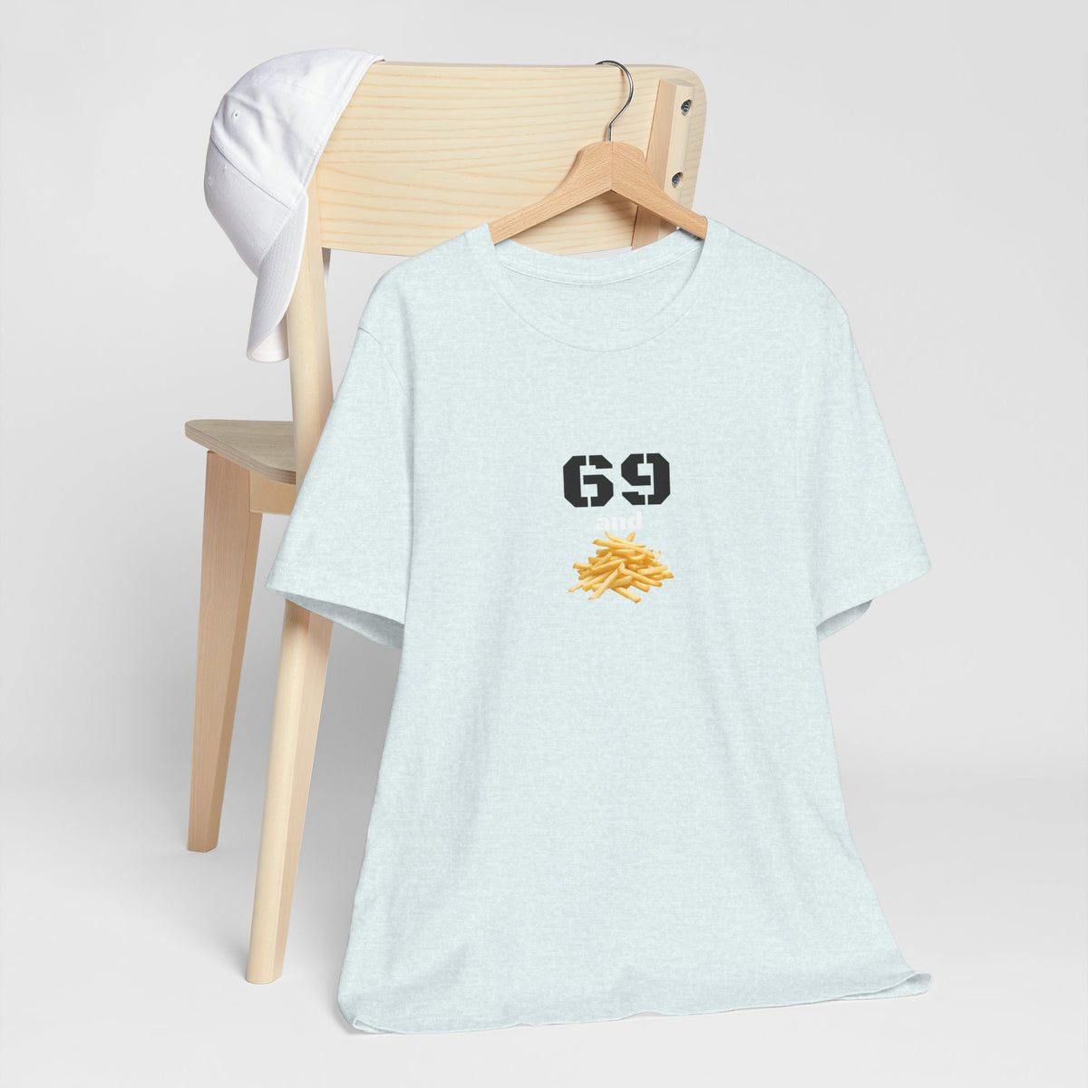 Unisex graphic T-shirt by Printify featuring a humorous 69 and French fries design on soft cotton fabric.