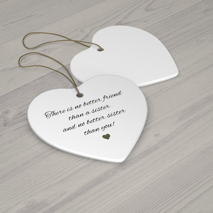 Ceramic "There is No Better Friend Than a Sister" heart ornament with engraved message, ideal for gifting or home decor.