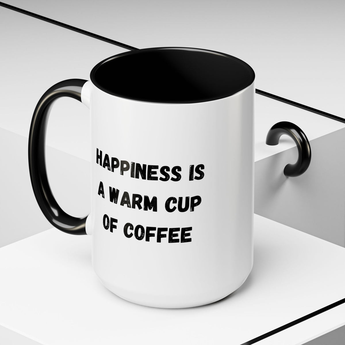 White ceramic coffee mug with "Happiness Is A Warm Cup Of Coffee" printed text, featuring a simple, clean design.