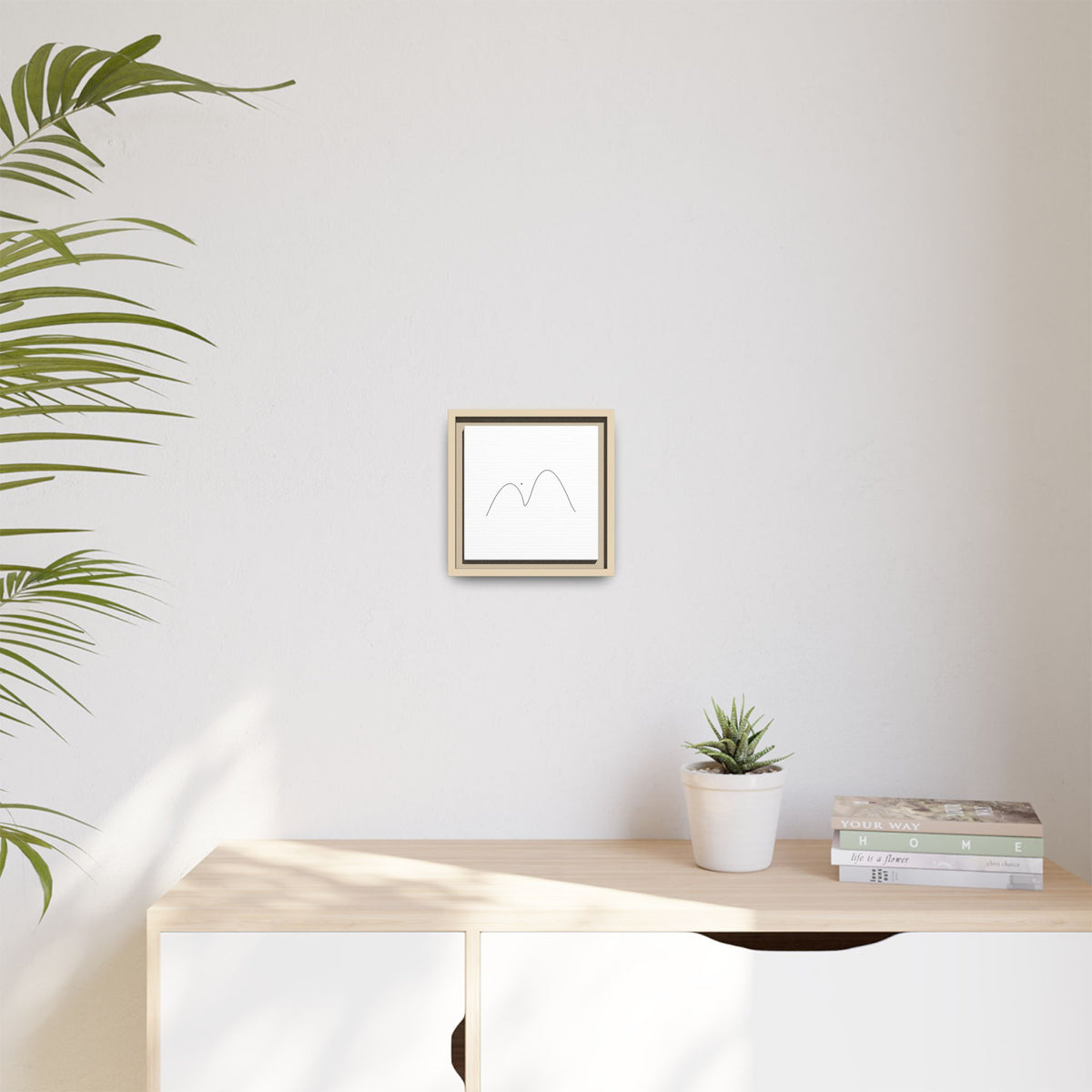 Minimalist mountain line art on framed matte canvas by Printify, showcasing sleek mountain silhouette artwork.
