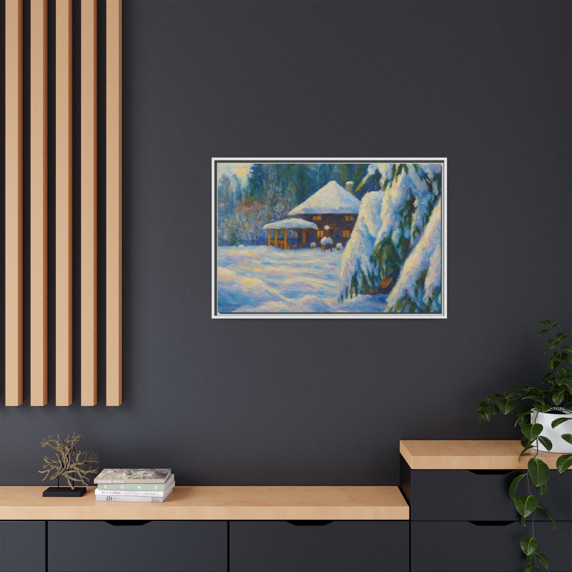Framed matte canvas wall art of a snowy cabin winter landscape, featuring a cozy cabin surrounded by snow-covered trees.