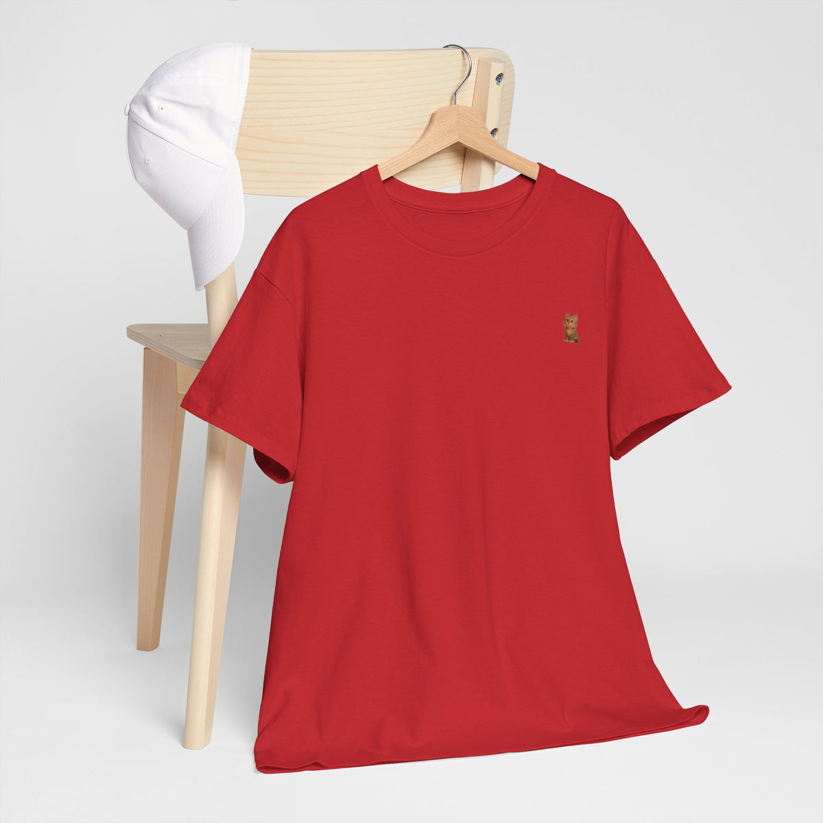 Cute brown kitten graphic T-shirt for cat lovers, featuring a playful feline design on a comfortable printify tee.