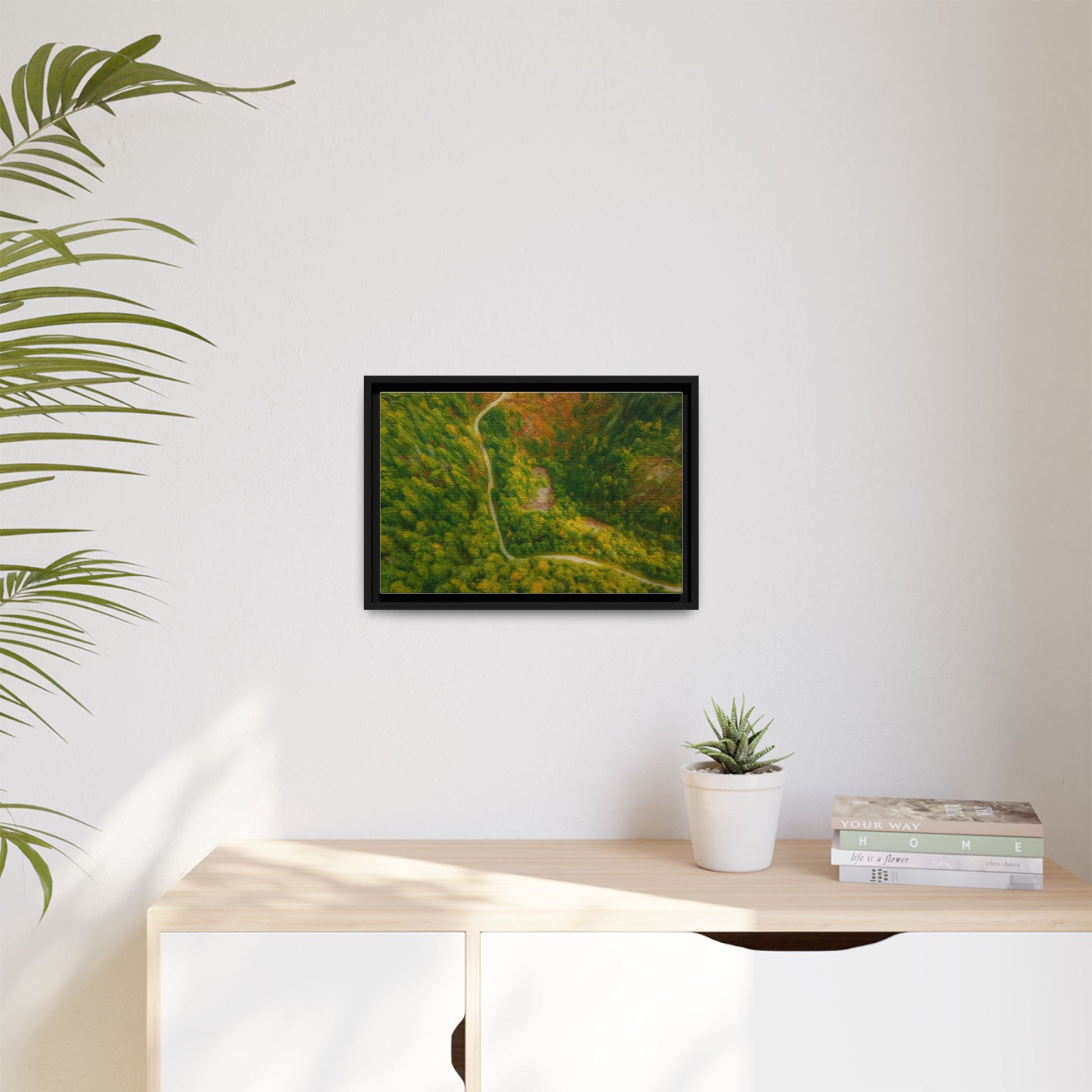 Colorful framed matte canvas wall art featuring a scenic aerial forest path landscape by Printify.