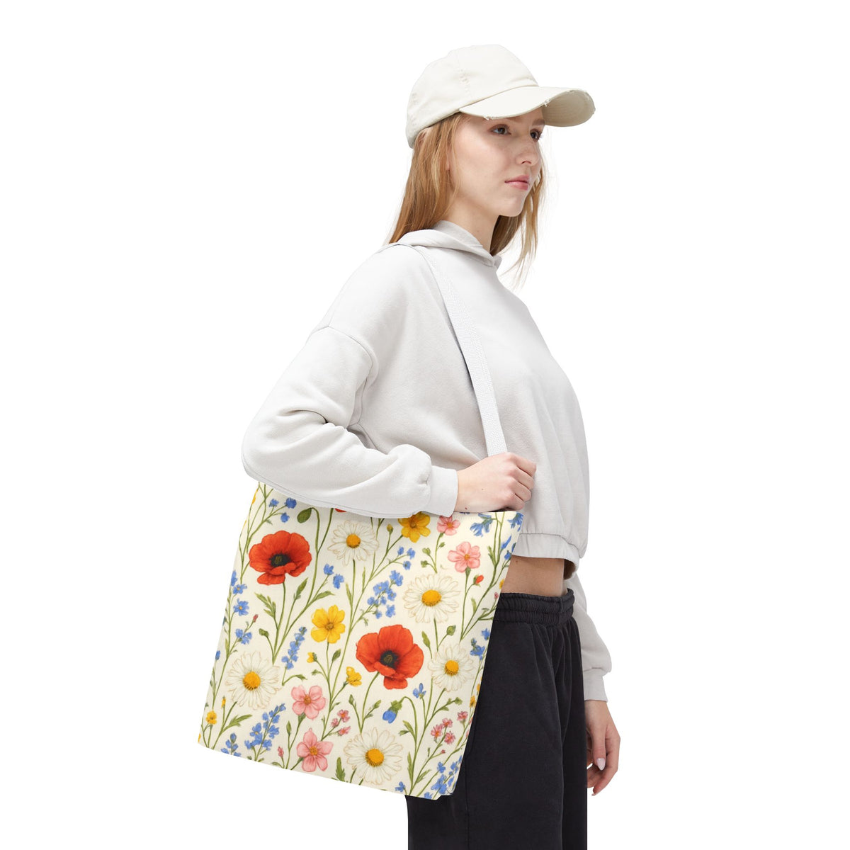 Wildflower Poppy print tote bag by Printify featuring a floral all-over pattern, made from durable fabric and ideal for everyday use.