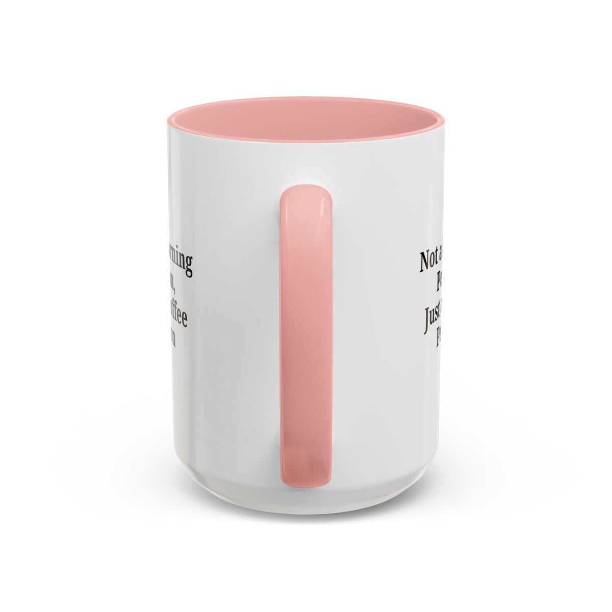 Ceramic coffee mug with "Not a Morning Person, Just a Coffee Person" text, featuring a handle and colorful design.