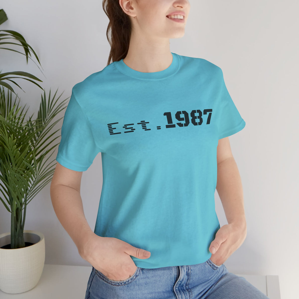Vintage Est. 1987 T-Shirt by Printify featuring bold "Born 1987" graphic on soft cotton fabric, perfect for retro style.