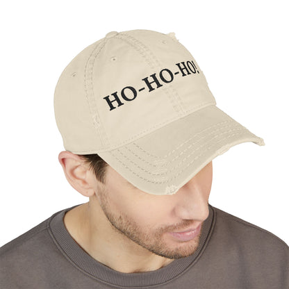 Distressed embroidered "HO-HO-HO" dad hat by Printify, featuring a classic baseball cap style with festive holiday design.