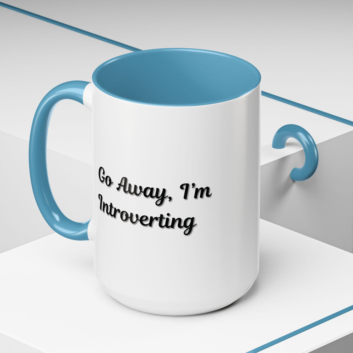 Ceramic coffee mug with "Go Away, I'm Introverting" slogan, 11 oz, white with black text, ideal for introverts.