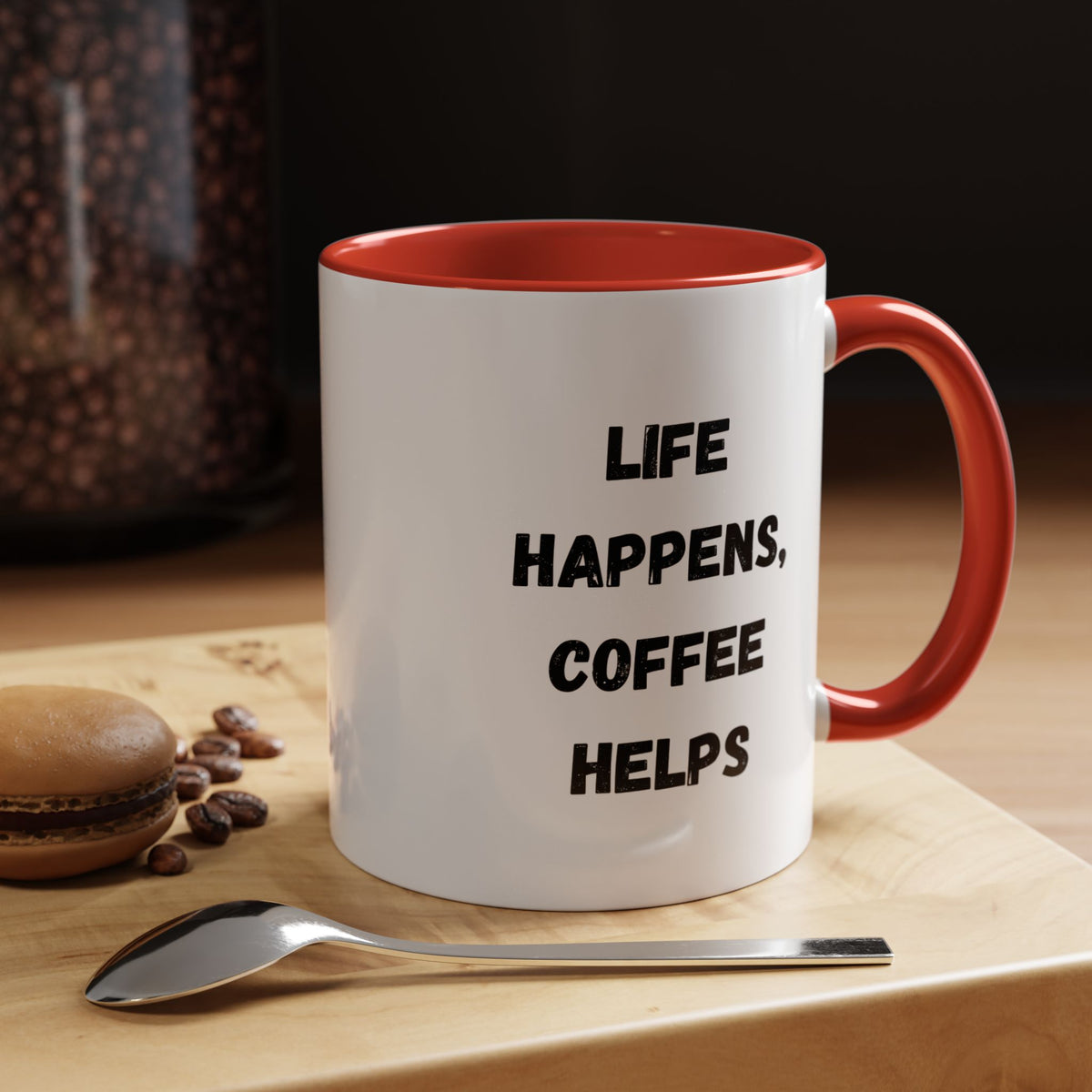 Black ceramic mug with "Life Happens Coffee Helps" slogan, 11oz size, with black handle and rim, by Printify.