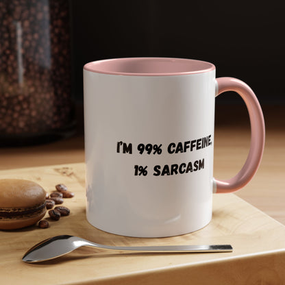 Ceramic coffee mug with "I'm 99% Caffeine, 1% Sarcasm" print, featuring a white background and bold black text.