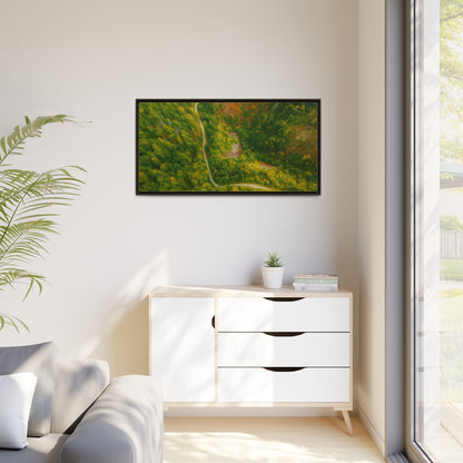 Colorful framed matte canvas wall art featuring an aerial forest path landscape by Printify.