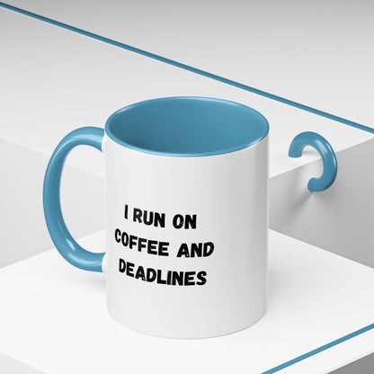 White ceramic coffee mug with "I Run on Coffee and Deadlines" slogan in black text, designed by Printify.