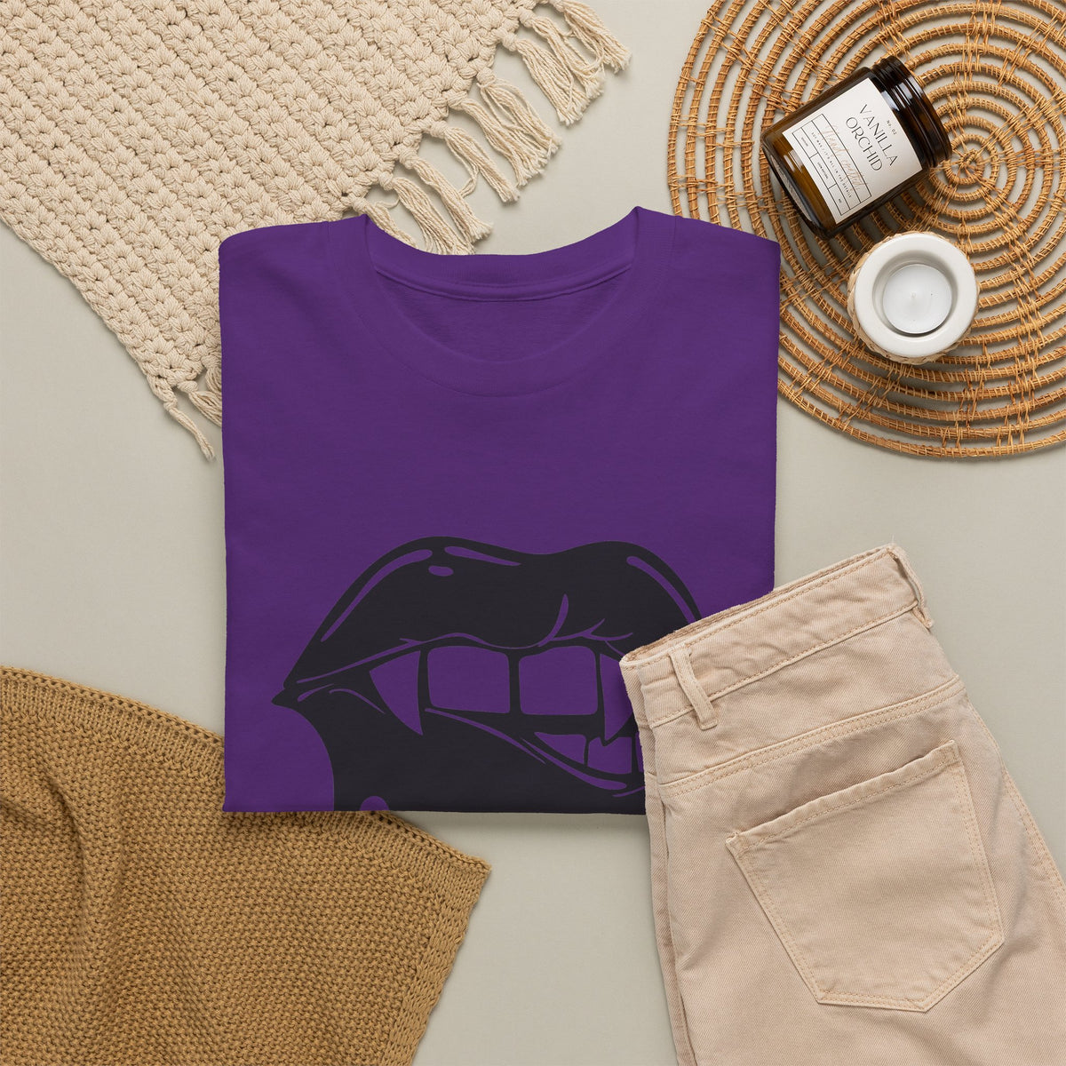 Black graphic T-shirt by Printify featuring a dripping lips 'hmm...' bite design on the front.