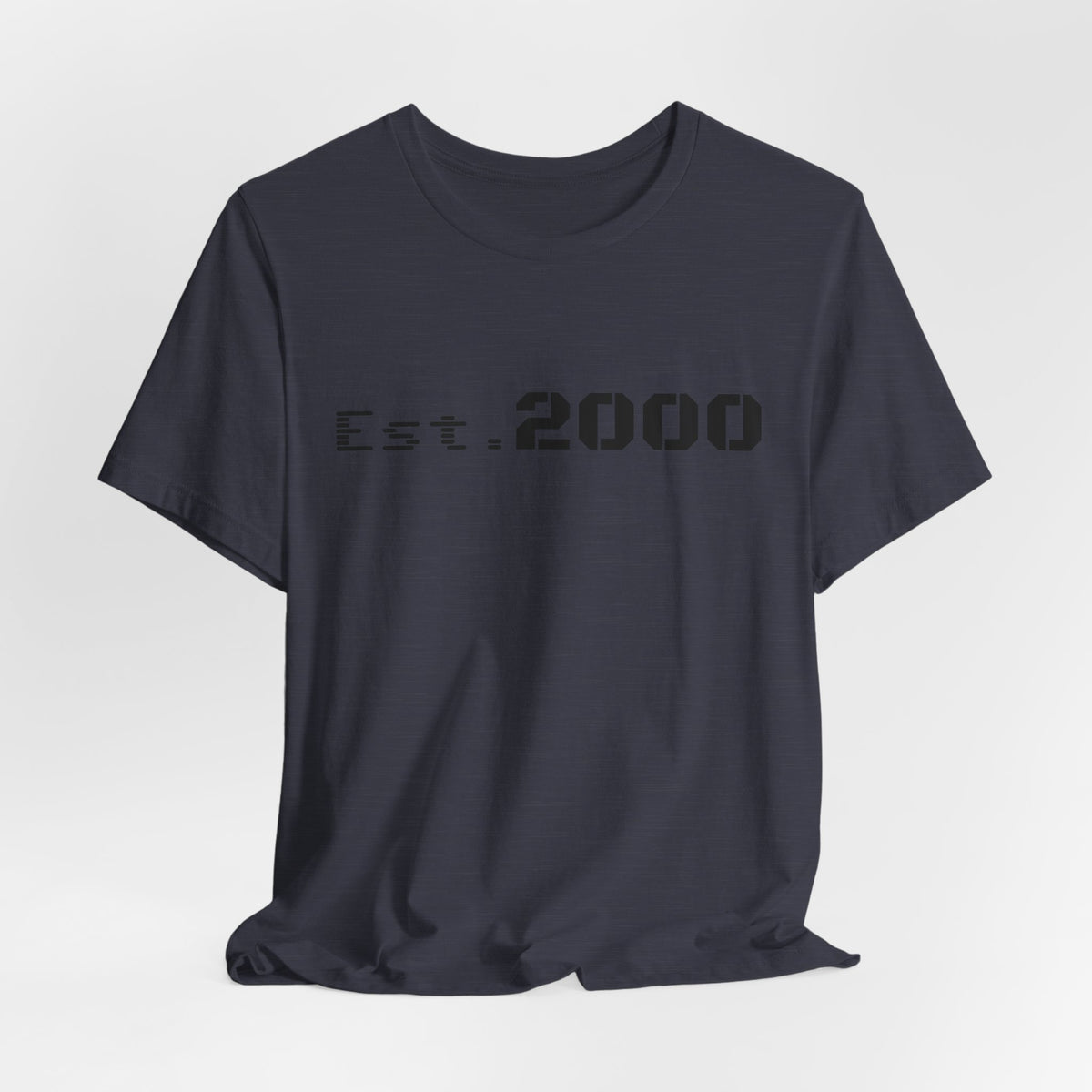 Black retro pixel T-shirt with "Born in 2000" text, featuring vintage-inspired design by Printify.