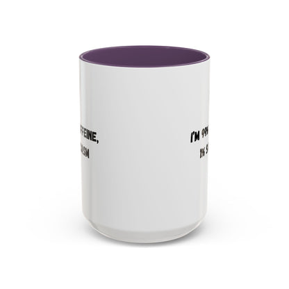 Ceramic coffee mug with "I'm 99% Caffeine, 1% Sarcasm" print, featuring a white background and colorful lettering.