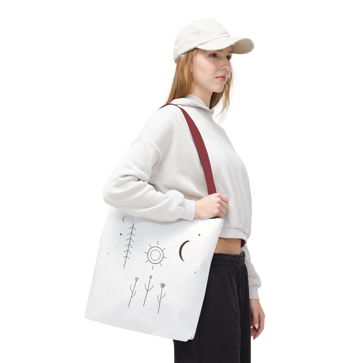 Minimal Moon and Sun botanical tote bag with celestial line art design, featuring nature-inspired artwork on a durable fabric bag.