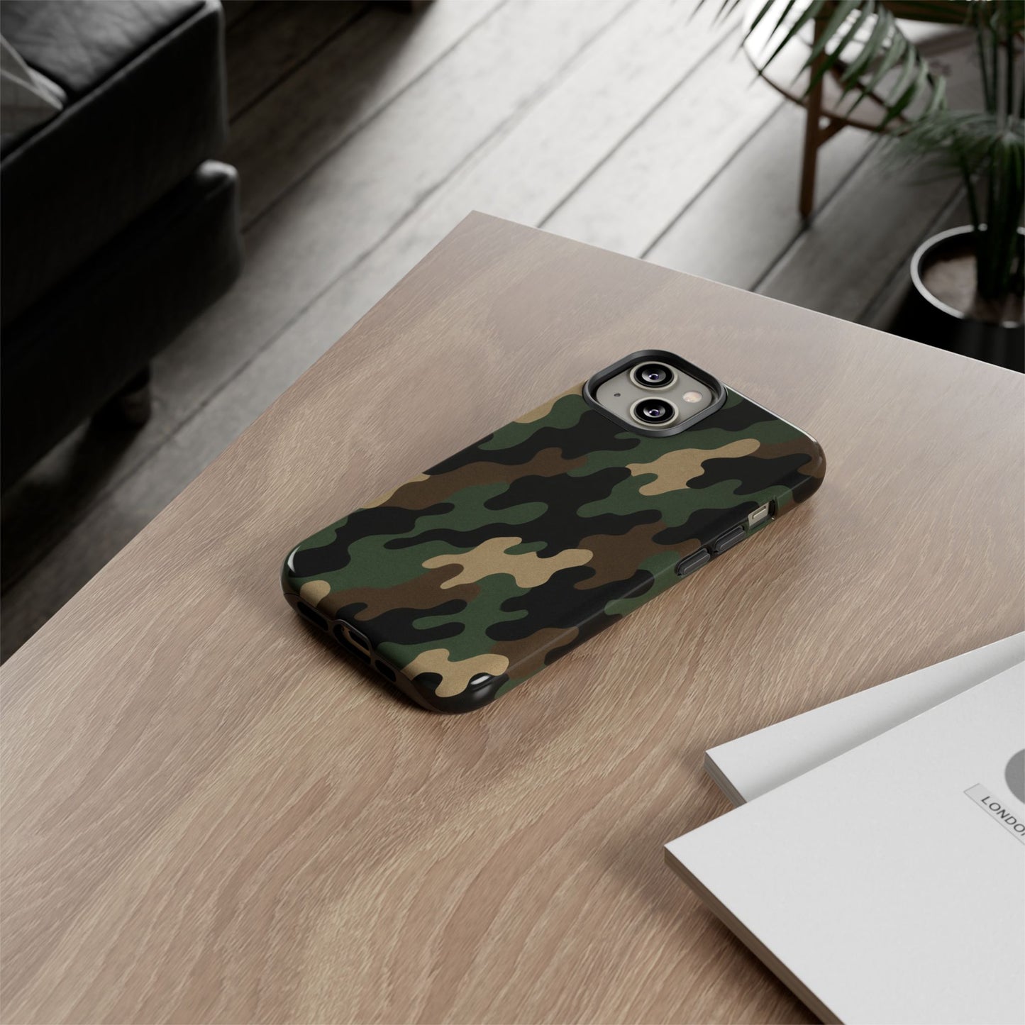 Camouflage tough phone case by Printify showing a rugged, protective camo design on a smartphone.
