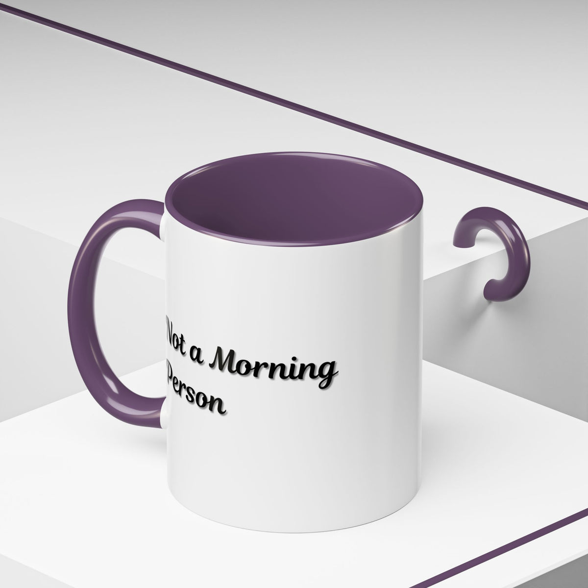 Ceramic coffee mug with "Not a Morning Person" print in 11oz or 15oz size, featuring a white background and black text.