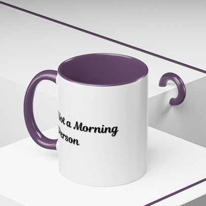 Ceramic coffee mug with "Not a Morning Person" print in 11oz or 15oz size, featuring a white background and black text.