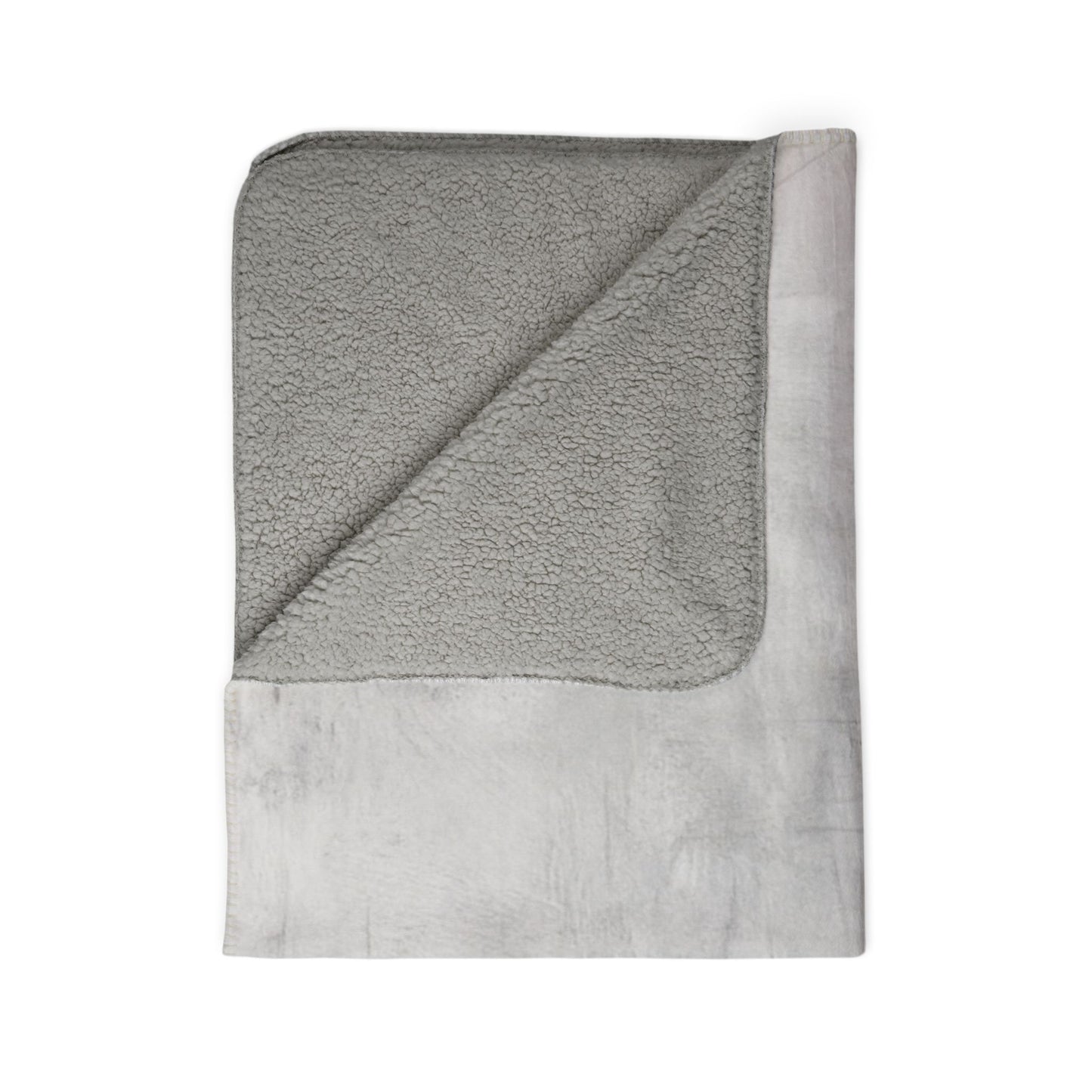 Soft Sherpa fleece throw blanket by Printify, perfect for cozy winter home decor, featuring plush texture and warm design.