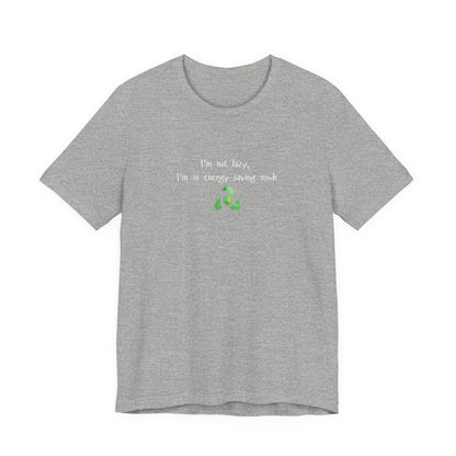 Eco humor T-shirt featuring the phrase "I’m Not Lazy, I’m an Energy-Saving Mock" printed on a casual Printify T-shirt.