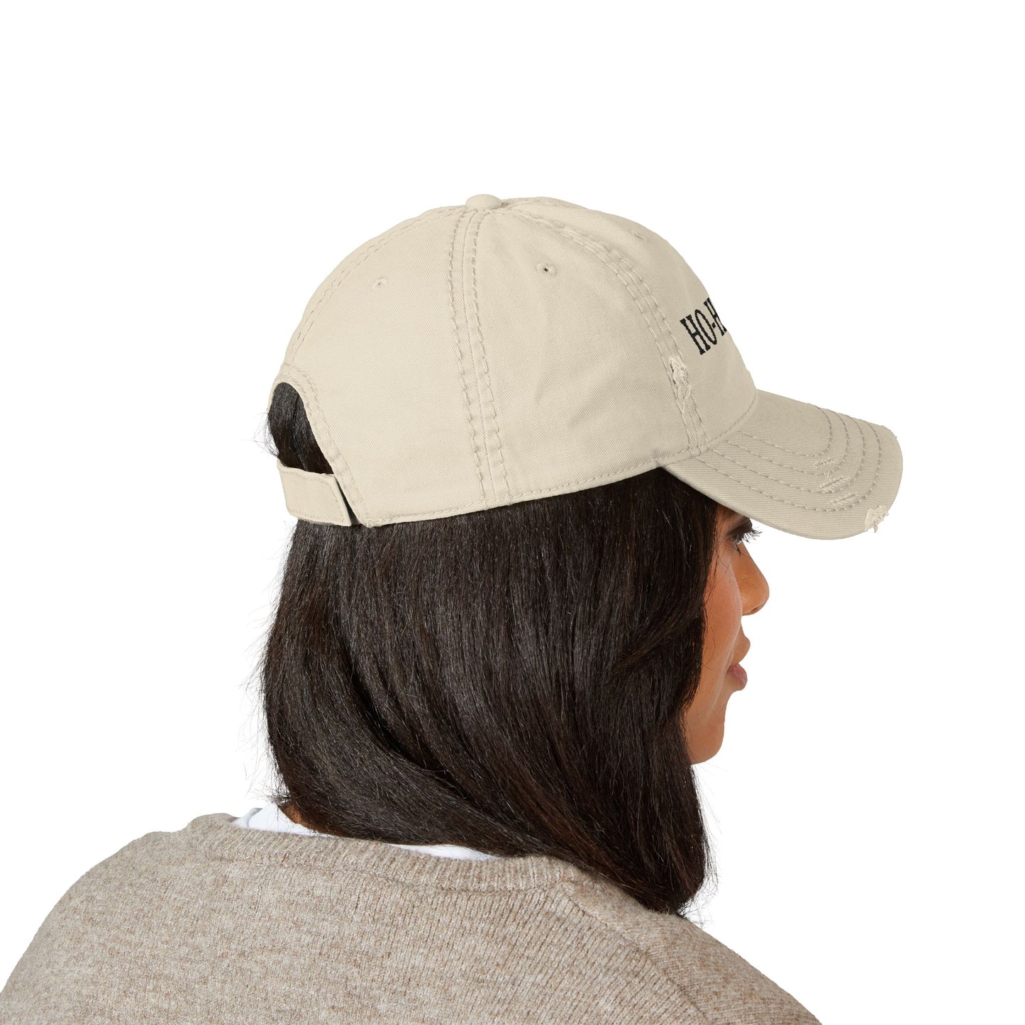 Distressed embroidered "HO-HO-HO" dad hat by Printify featuring a casual baseball cap style and adjustable strap.