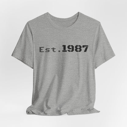 Vintage Est. 1987 T-Shirt by Printify featuring retro-inspired design and classic born in 1987 lettering on a comfortable fabric.