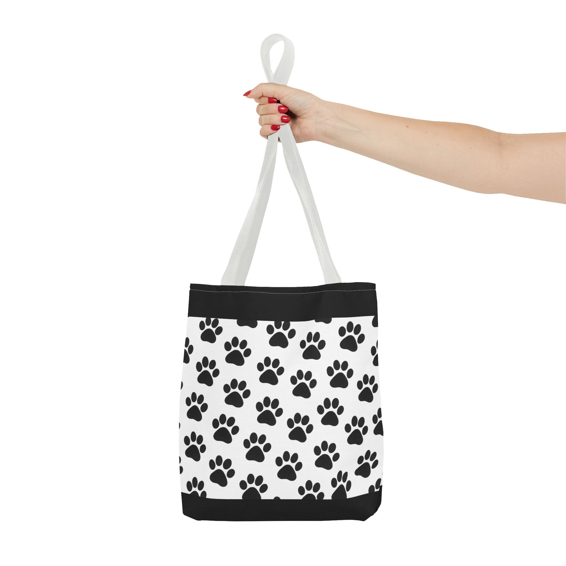 Eco-friendly paw print tote bag by Printify, durable carryall with dog and cat paw designs, perfect for pet lovers.
