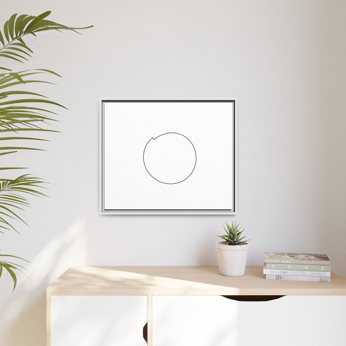 Framed matte canvas wall art featuring a minimal circular line design, by Printify, displayed on a wall.