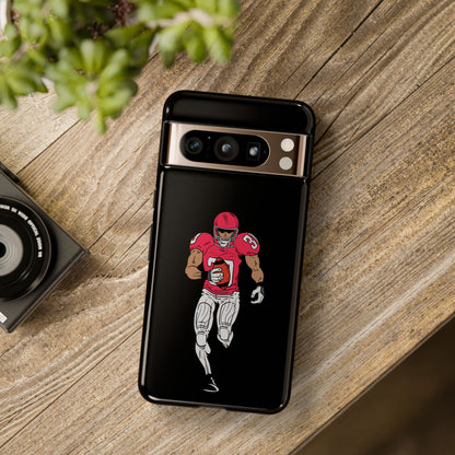 Black football player tough phone case for iPhone, protective sports design by Printify, featuring an athletic football scene.