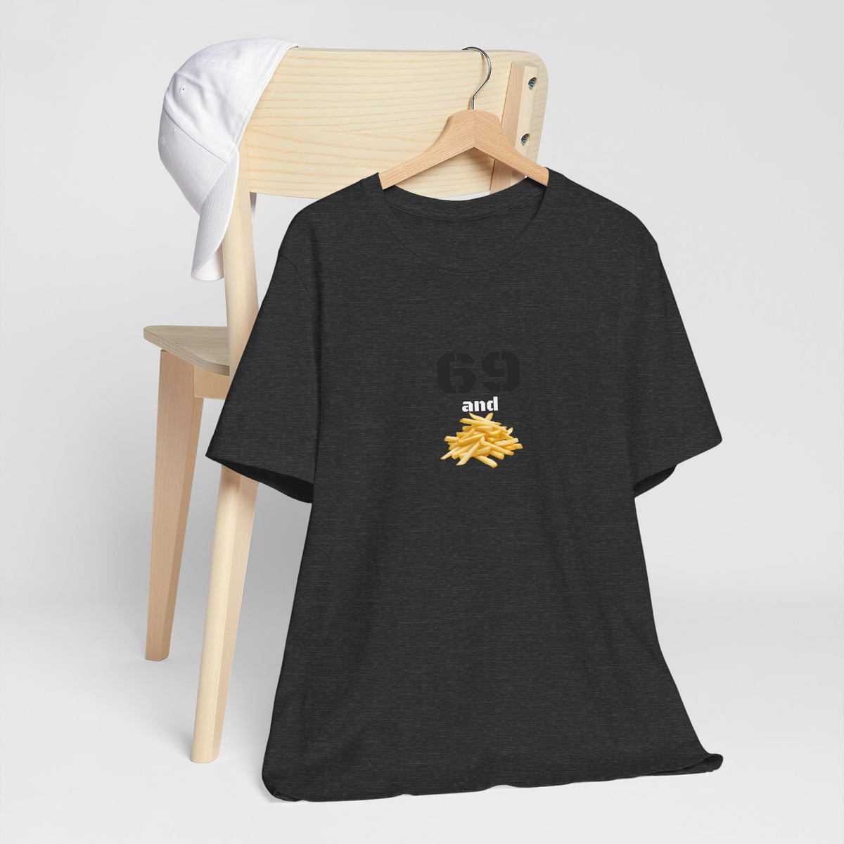 Unisex graphic T-shirt featuring a humorous 69 and French fries design, in soft fabric with a casual fit.