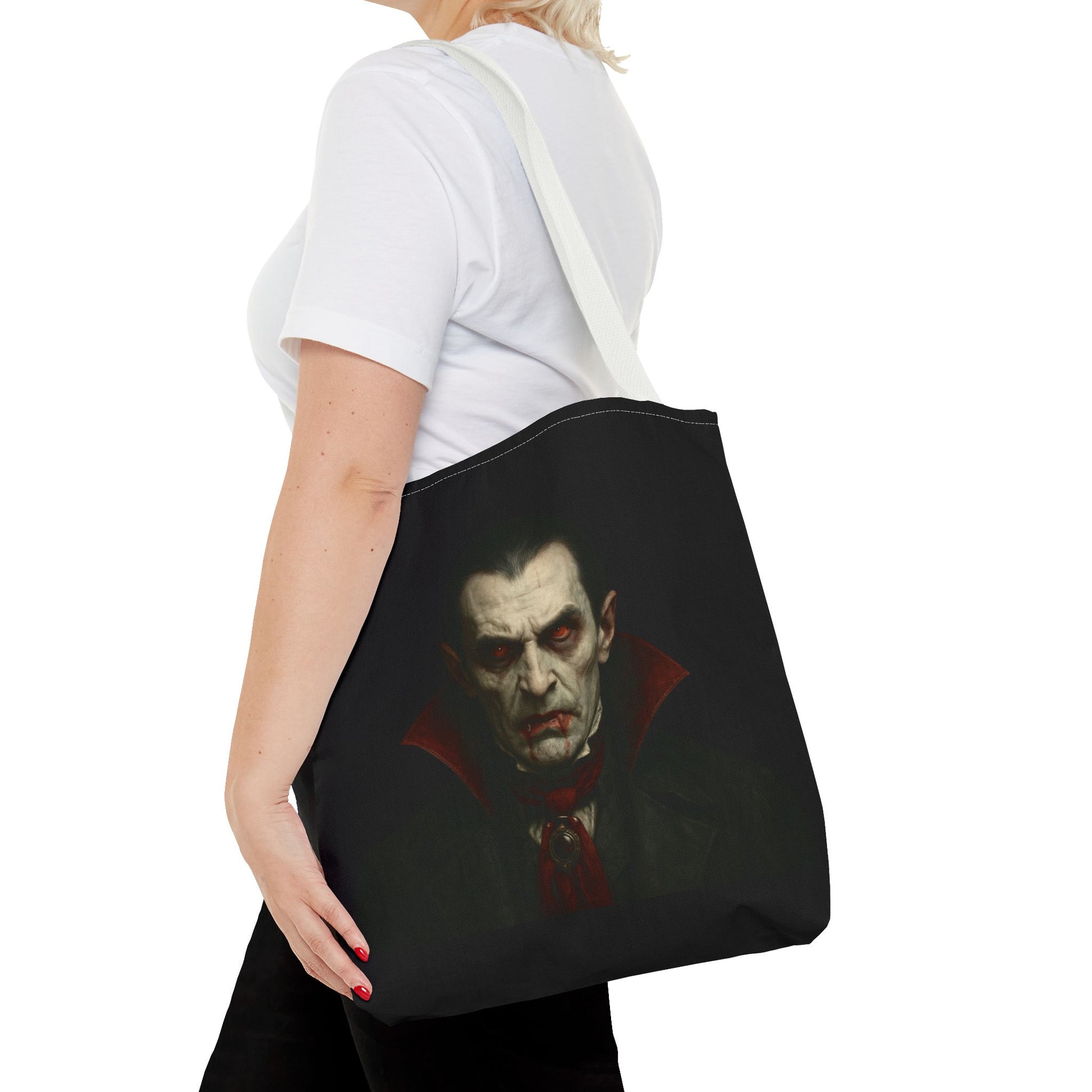 Black vampire tote bag with spooky gothic Halloween design, featuring a vampire motif on durable Printify bag.
