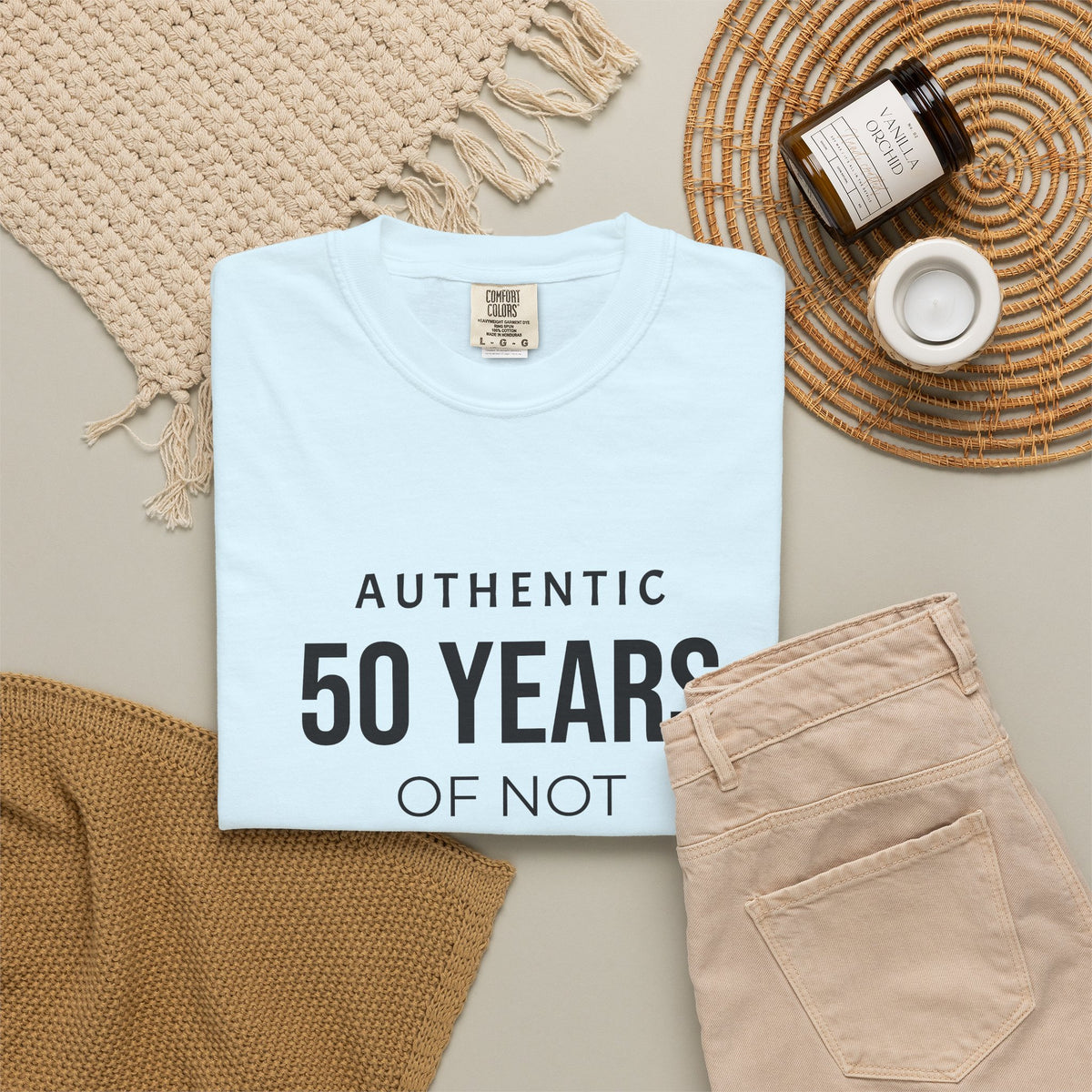 Custom garment-dyed T-shirt by Printify featuring a plain, soft cotton fabric in a relaxed fit, perfect for personalized designs.
