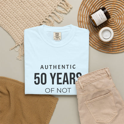 Custom garment-dyed T-shirt by Printify featuring a plain, soft cotton fabric in a relaxed fit, perfect for personalized designs.