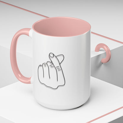 White ceramic coffee mug with minimal Korean finger heart accent design, 11oz, by Printify, shown with a close-up of the heart detail.