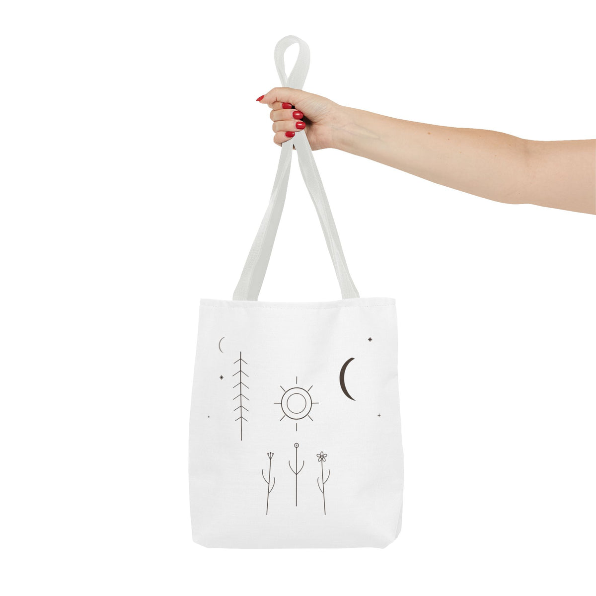 Minimal moon and sun botanical tote bag featuring celestial line art, bright white fabric with printed celestial design.