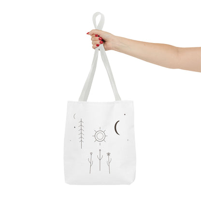 Minimal moon and sun botanical tote bag featuring celestial line art, bright white fabric with printed celestial design.