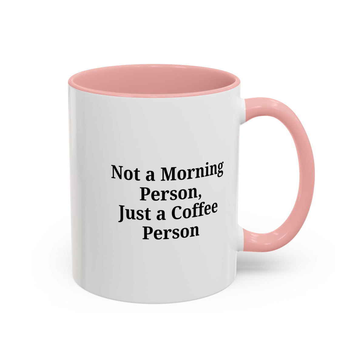 Ceramic coffee mug with "Not a Morning Person, Just a Coffee Person" print, perfect for morning beverages.