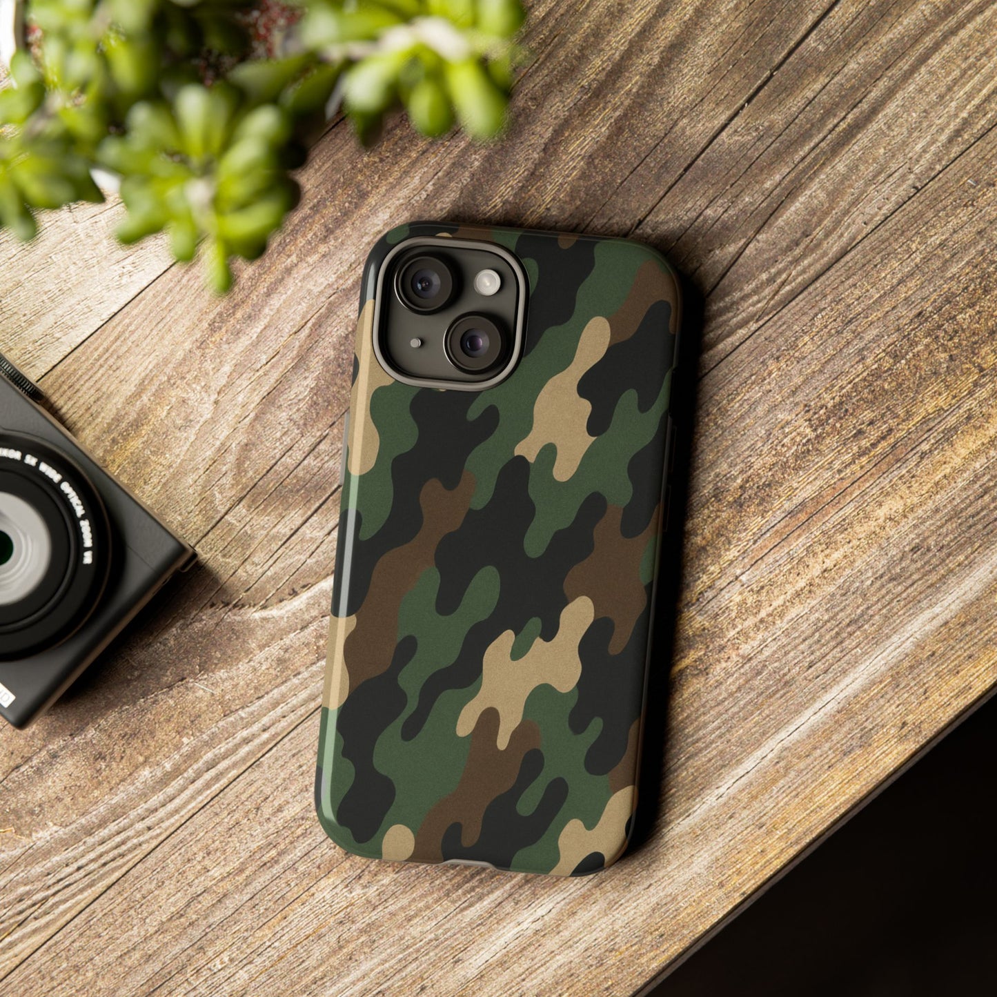 Camouflage tough phone case by Printify with rugged camo design providing durable protection for smartphones.