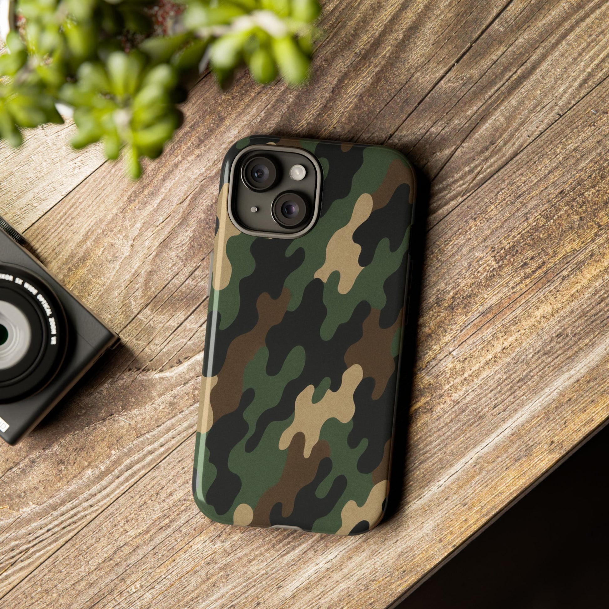 Camouflage tough phone case by Printify with rugged camo design providing durable protection for smartphones.