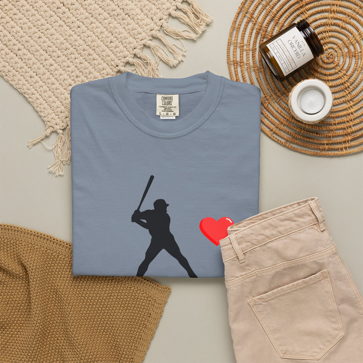 White baseball batter heart T-shirt by Printify featuring a graphic of a batter in action on the front.