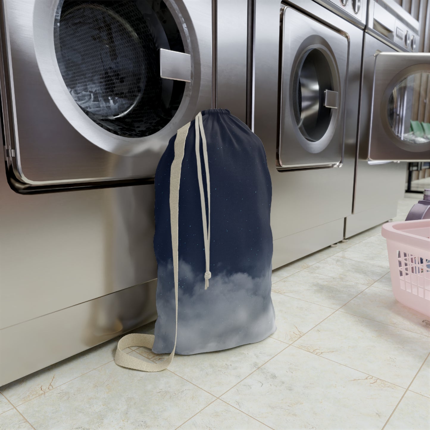 Printify Night Sky Clouds laundry bag with drawstring canvas tote, featuring a celestial cloud design and sturdy handle.