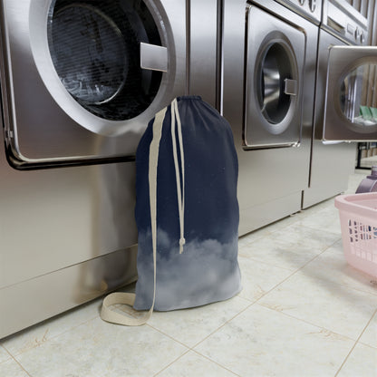 Printify Night Sky Clouds laundry bag with drawstring canvas tote, featuring a celestial cloud design and sturdy handle.