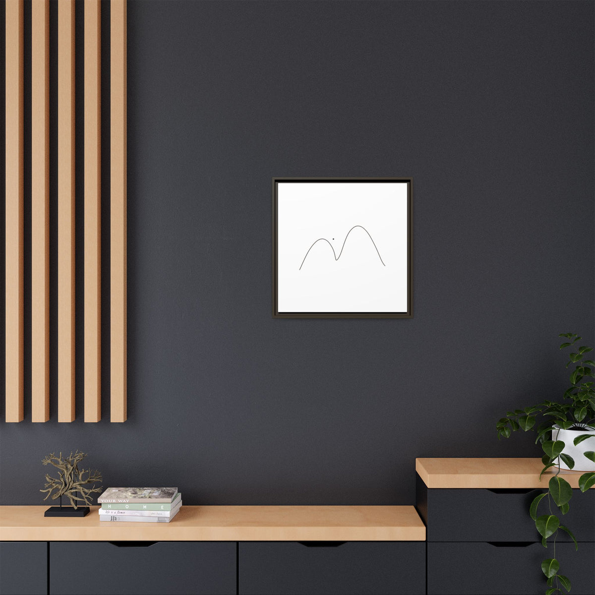 Framed minimalist mountain line art on matte canvas by Printify, showcasing simple, elegant mountain outline artwork.