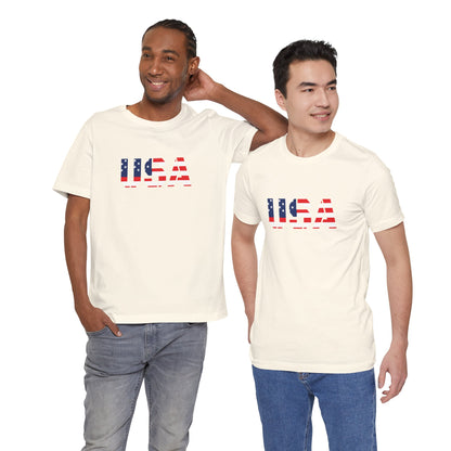 Red, white, and blue USA flag text T-shirt by Printify featuring patriotic Fourth of July design on a casual tee.