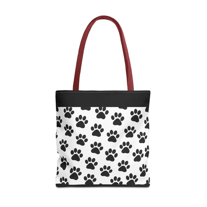Eco-friendly paw print tote bag by Printify, featuring dog and cat paw prints, ideal for pet lovers and casual carryall use.